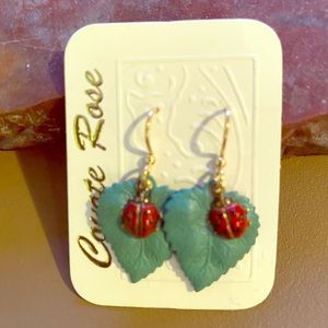 Green leaf and ladybug pierced earrings